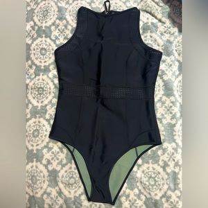 Rip curl  black heavy body suit. (never worn)
